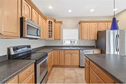 8905 Silk Bay Place, Orlando, FL 32827 - Photo 11