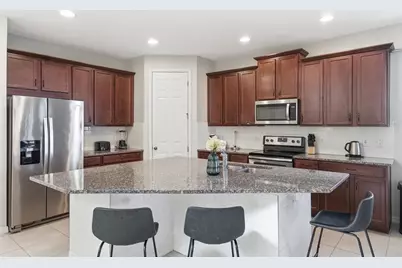 9013 Egret Mills Terrace, Kissimmee, FL 34747 - Photo 9