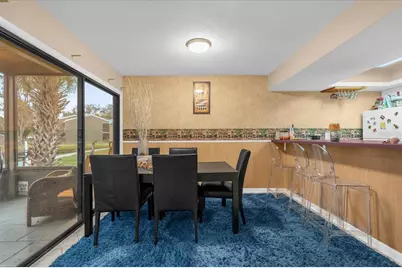 5842 Peregrine Avenue #C01, Orlando, FL 32819 - Photo 7