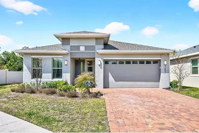 7651 Five Oaks Drive, Harmony, FL 34773 - Photo 1