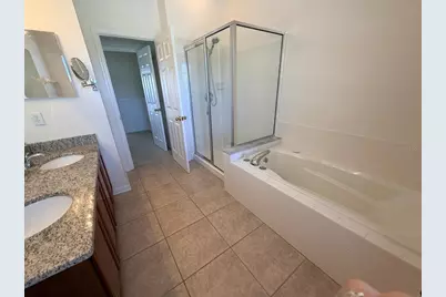 8911 Silk Bay Place, Orlando, FL 32827 - Photo 13