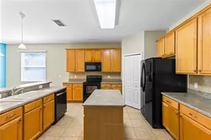 6658 Lake Pembroke Pl, Orlando, FL 32829 - Photo 9