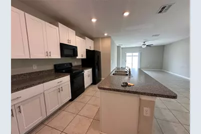 7157 Samuel Ivy Drive, Tampa, FL 33619 - Photo 7