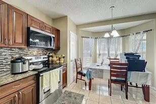 8016 Equitation Ct, Orlando, FL 32818 - Photo 9