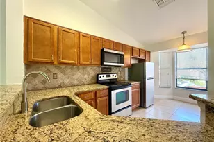 7872 Sugar View Ct, Orlando, FL 32819 - Photo 9