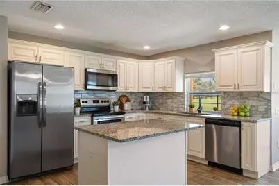 7037 Edgeworth Drive, Orlando, FL 32819 - Photo 19