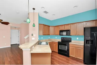3717 Clubside Pointe Drive, Orlando, FL 32810 - Photo 13
