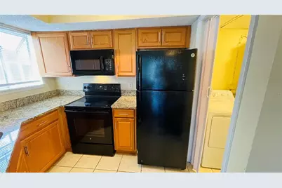 1932 Lake Atriums Circle #74, Orlando, FL 32839 - Photo 5