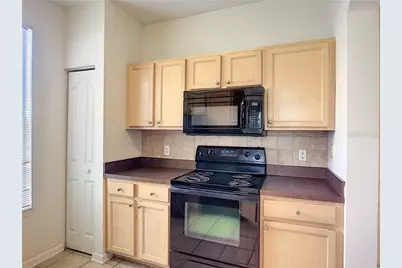 12824 Madison Pointe Circle #103, Orlando, FL 32821 - Photo 7
