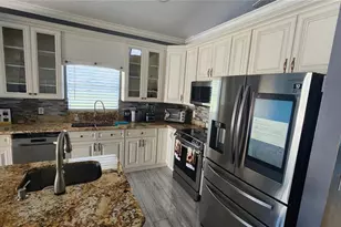 7809 Rex Hill Trail, Orlando, FL 32818 - Photo 9