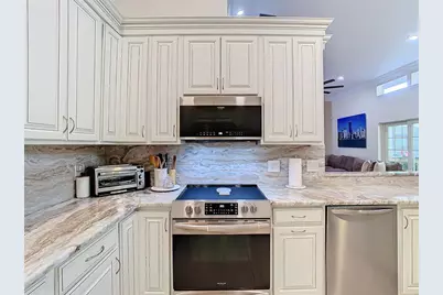 8707 Fernwicke Court, Orlando, FL 32819 - Photo 17