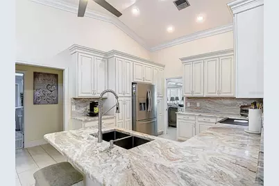 8707 Fernwicke Court, Orlando, FL 32819 - Photo 21