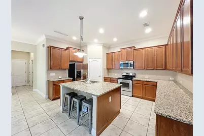 8461 Greider Way, Orlando, FL 32827 - Photo 9
