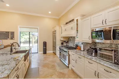 5719 Emerson Pointe Way, Orlando, FL 32819 - Photo 9