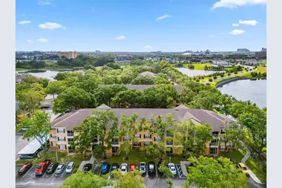 7606 Pissarro Drive #104, Orlando, FL 32819 - Photo 1