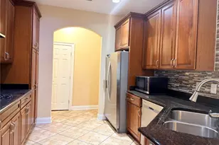 6935 Brescia Way, Orlando, FL 32819 - Photo 11