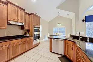 6977 Dolce St, Orlando, FL 32819 - Photo 15