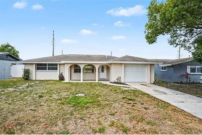 7037 Magnolia Valley Drive, New Port Richey, FL 34653 - Photo 1