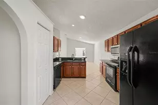 11040 NW Fairhaven Way, Orlando, FL 32825 - Photo 7