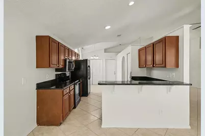 11040 NW Fairhaven Way, Orlando, FL 32825 - Photo 7
