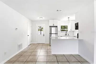 5465 Lescot Lane, Orlando, FL 32811 - Photo 9