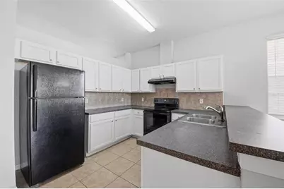 949 Whispering Cypress Lane, Orlando, FL 32824 - Photo 5