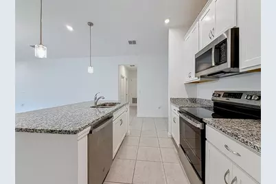 418 Quayside Avenue, Mascotte, FL 34753 - Photo 9