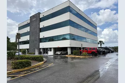 7345 W Sand Lake Road #404, Orlando, FL 32819 - Photo 1