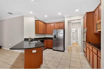 10025 Leyburn Court, Orlando, FL 32825 - Photo 11