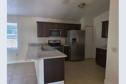 1003 Winterberry Lane, Orlando, FL 32811 - Photo 5