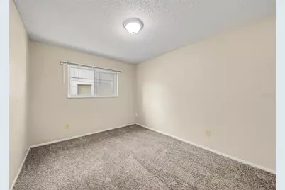7734 Lakeside Woods Drive, Orlando, FL 32810 - Photo 9