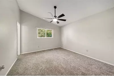 7734 Lakeside Woods Drive, Orlando, FL 32810 - Photo 7