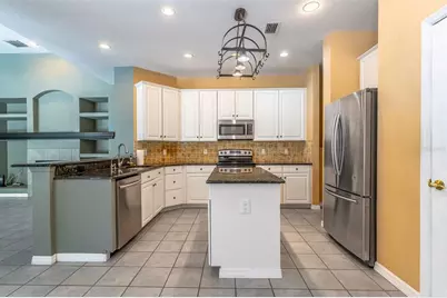 4554 Shanewood Court, Orlando, FL 32837 - Photo 13