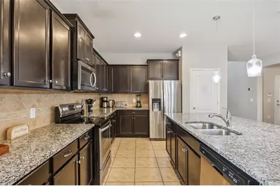 8875 Qin Loop, Kissimmee, FL 34747 - Photo 11