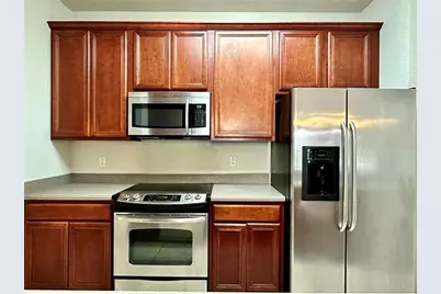 3338 Robert Trent Jones Drive #210, Orlando, FL 32835 - Photo 5