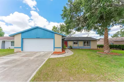 10312 Lazy Lake Drive, Orlando, FL 32821 - Photo 1