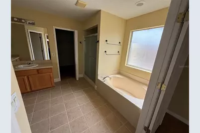 933 Whispering Cypress Lane, Orlando, FL 32824 - Photo 13