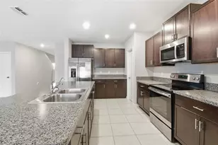 7329 Canterbury Bells Ct, Tampa, FL 33619 - Photo 23