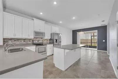 2548 Nouveau Way, Kissimmee, FL 34741 - Photo 11