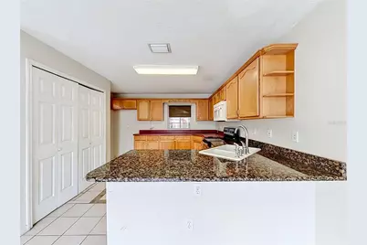 5306 Grove Crossings Boulevard, Orlando, FL 32839 - Photo 17