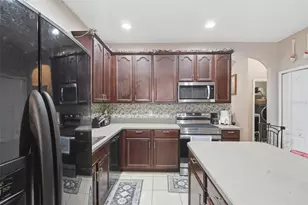 1676 Canoe Creek Falls Dr, Orlando, FL 32824 - Photo 25