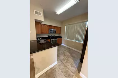 2668 Robert Trent Jones Drive #410, Orlando, FL 32835 - Photo 9