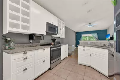 10707 Palaiseau Court, Orlando, FL 32825 - Photo 7