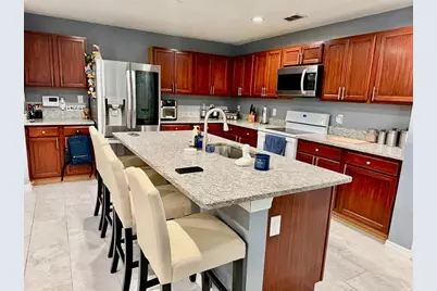 7821 Falabella Court, Orlando, FL 32818 - Photo 7