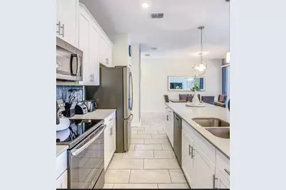 452 Ocean Course Avenue, Champions Gate, FL 33896 - Photo 23