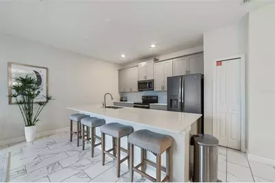 388 Ocean Course Avenue, Champions Gate, FL 33896 - Photo 9