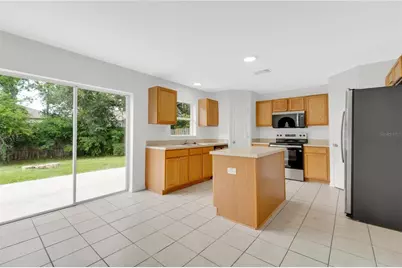 30131 Rattana Court, Wesley Chapel, FL 33545 - Photo 7