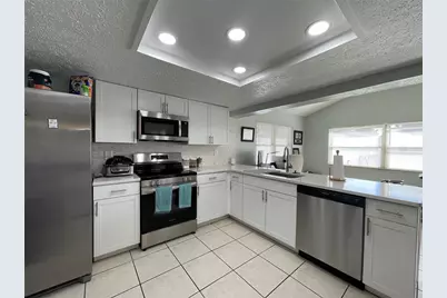 8910 Elm Leaf Court, Port Richey, FL 34668 - Photo 13