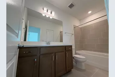 6888 Gilly Shadow Street, Wesley Chapel, FL 33545 - Photo 19