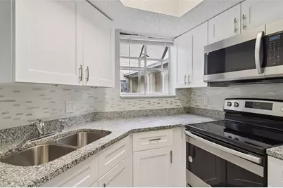 1948 Lake Atriums Circle #124, Orlando, FL 32839 - Photo 7